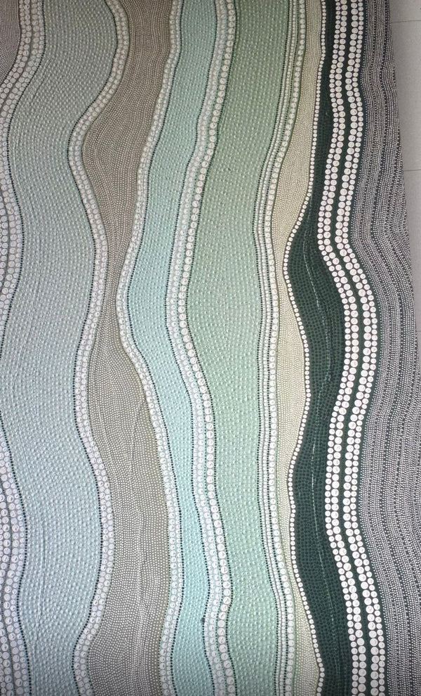 A stylish rug with waves displayed in a living room, contributing to the overall aesthetic of the space.